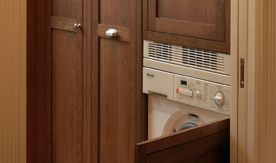 Hideaway laundry cabinets